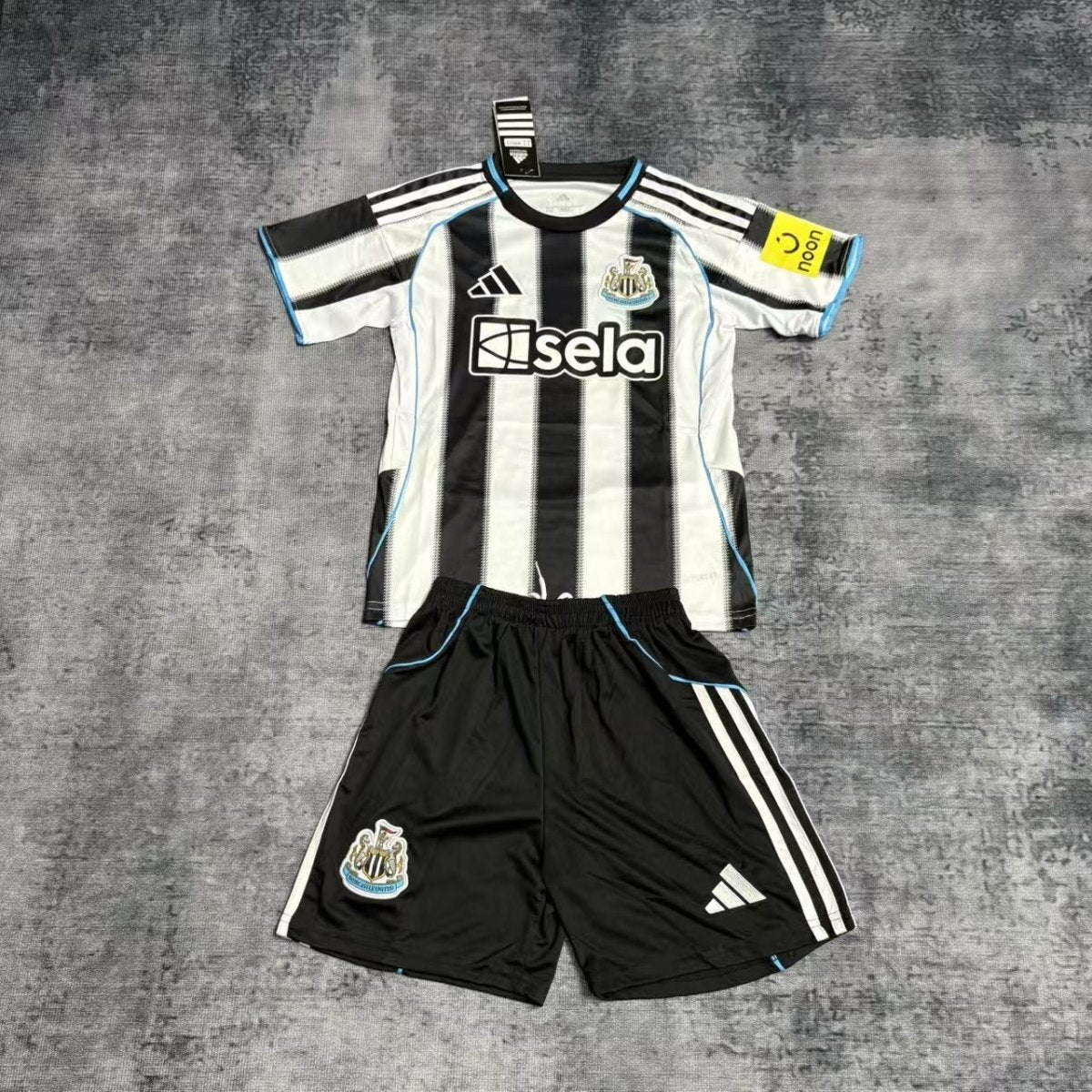 Conjunto infantil Newcastle 2025/26